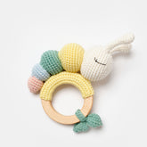 Colorful organic caterpillar teether toy laid flat
